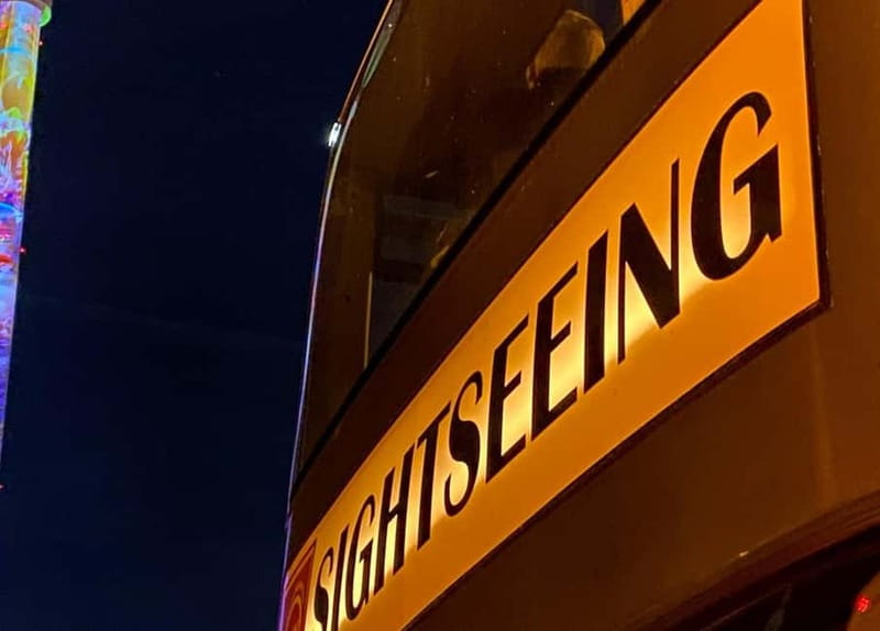 Berlin: Bus Tour by Night with Live Commentary - Potsdamer Platz and Friedrichstraße under lights