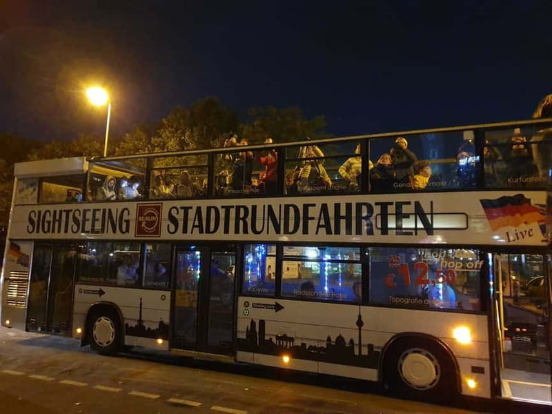 Berlin: Bus Tour by Night with Live Commentary - Alexanderplatz, the Red Town Hall, and World Clock