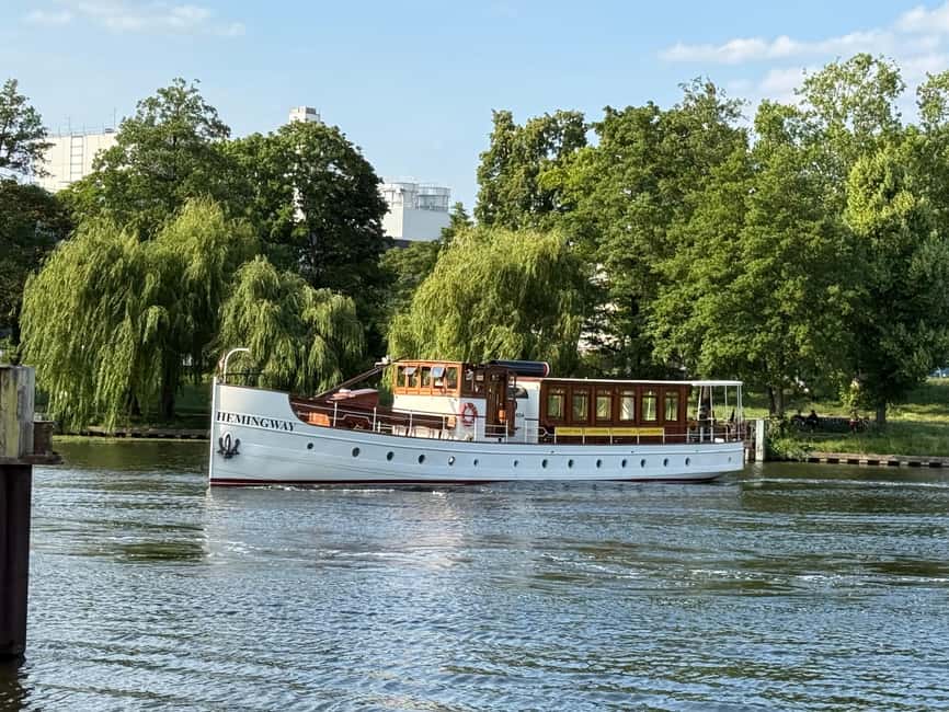 Berlin: Historic Boat Sightseeing City Center Tour - The saloon, drinks, music, and onboard comfort