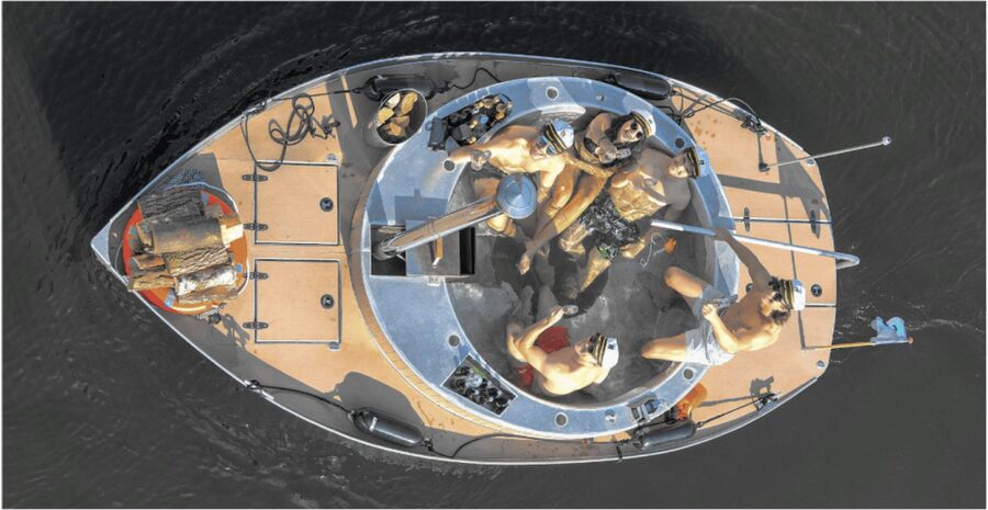 Berlin: Self-drive hot tub boat experience - Keeping the wood-fired water warm