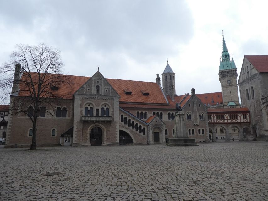 Braunschweig: Private City Walking Tour with Certified Guide - Burgplatz, where Braunschweig puts its symbols on display