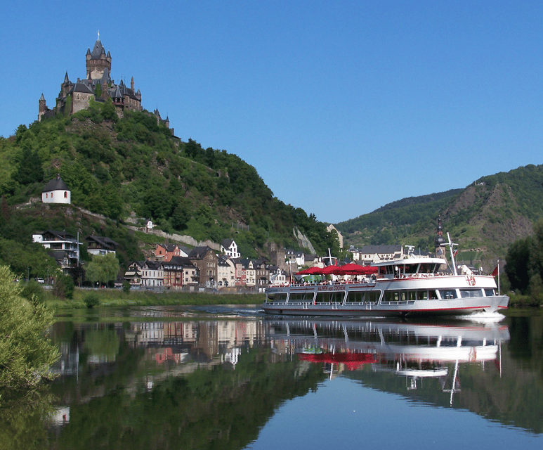 Cochem, Moselle: Castle, boat and wine tour - Four wines in a cellar, plus one bottle for home