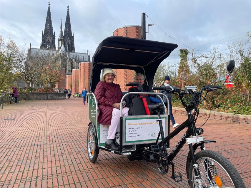 Cologne: Private Rickshaw Tour - Choosing the riverside finish at Rheinauhafen