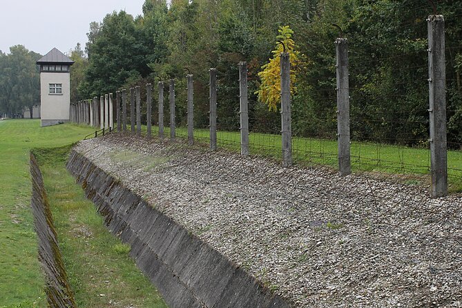 Dachau Small-Group Half-Day Tour from Munich By Train - Entering through the Jourhaus and Arbeit Macht Frei gate