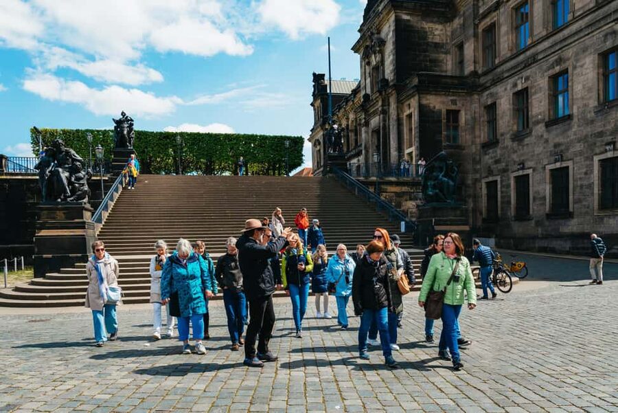 Dresden: Guided City Walk with a Cup of Coffee - Taschenbergpalais, the cathedral, and Augustus Bridge