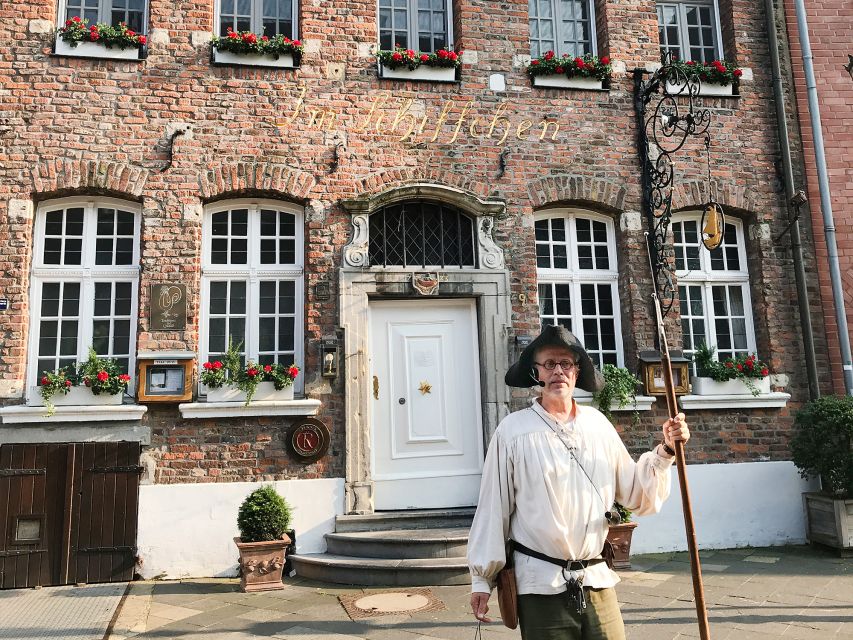 Düsseldorf: Guided Night Watchman Tour through Kaiserswerth - Mill Tower, Klemens Bridge, and the feel of the route