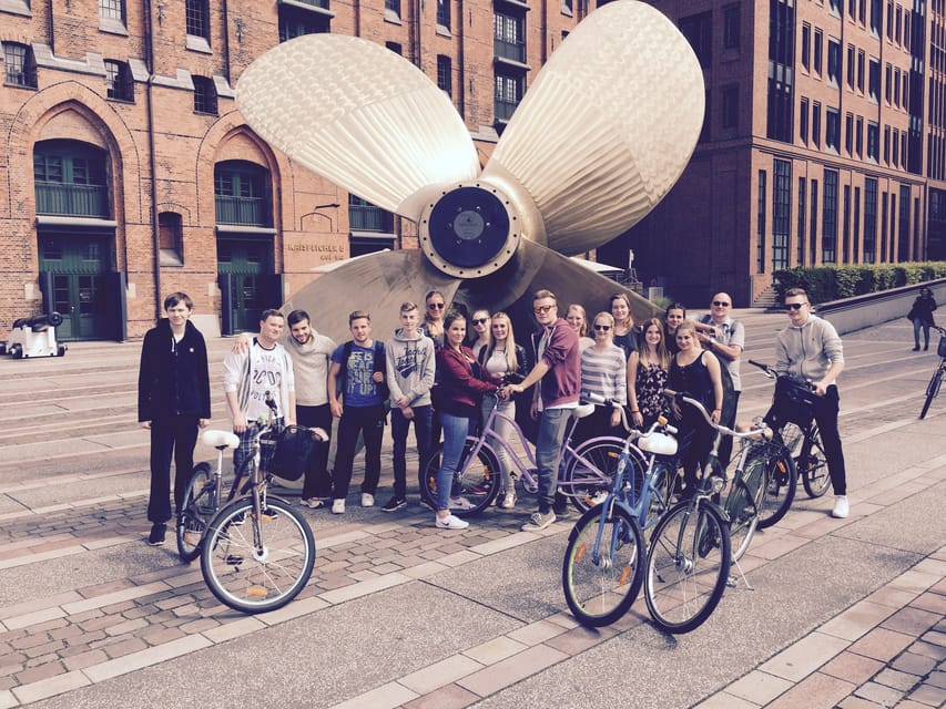 Hamburg: Guided Bike Tour - Reaching the harbor at Landungsbrücken
