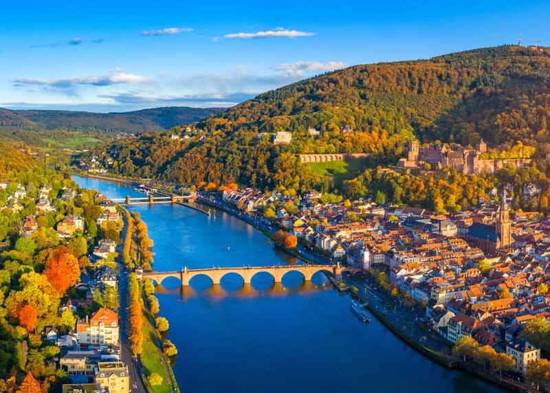 The Neckar, the old bridge and the Heidelberg rooftops from the hill path