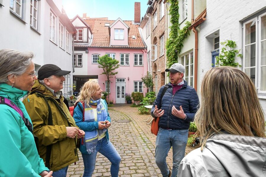Lübeck: Entertaining Tour Through Hidden Courtyards - Starting at the Burgtor