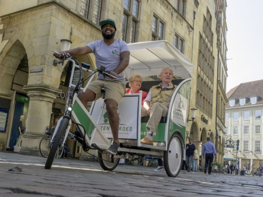 Münster: Private Guided Rickshaw City Tour - Münster Cathedral as the final landmark